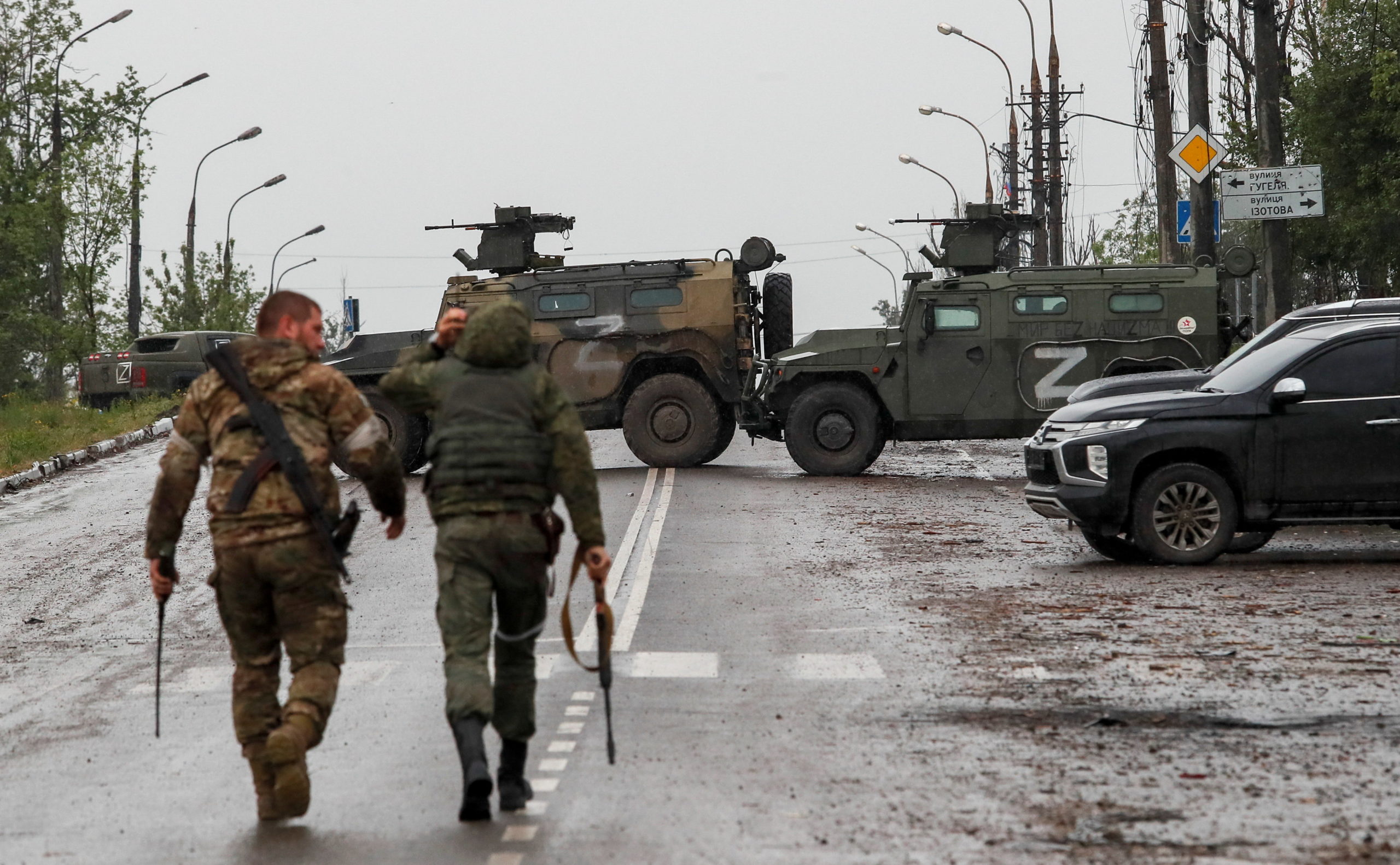 Service members of proRussian troops walk in Mariupol جلنار Jollanar